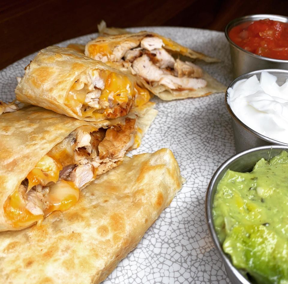 Order Three-Cheese Quesadilla food online from Tick tock diner ny store, New York on bringmethat.com