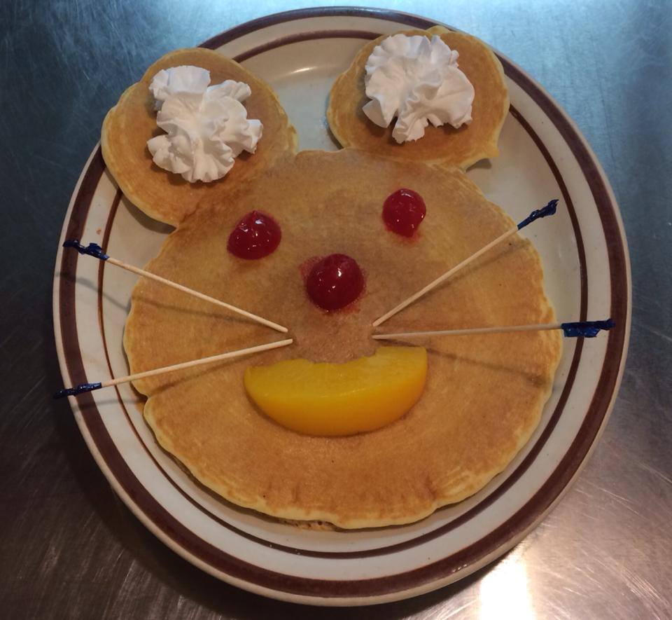 Order Mickey Mouse Pancakes food online from New Day Cafe store, Terre Haute on bringmethat.com