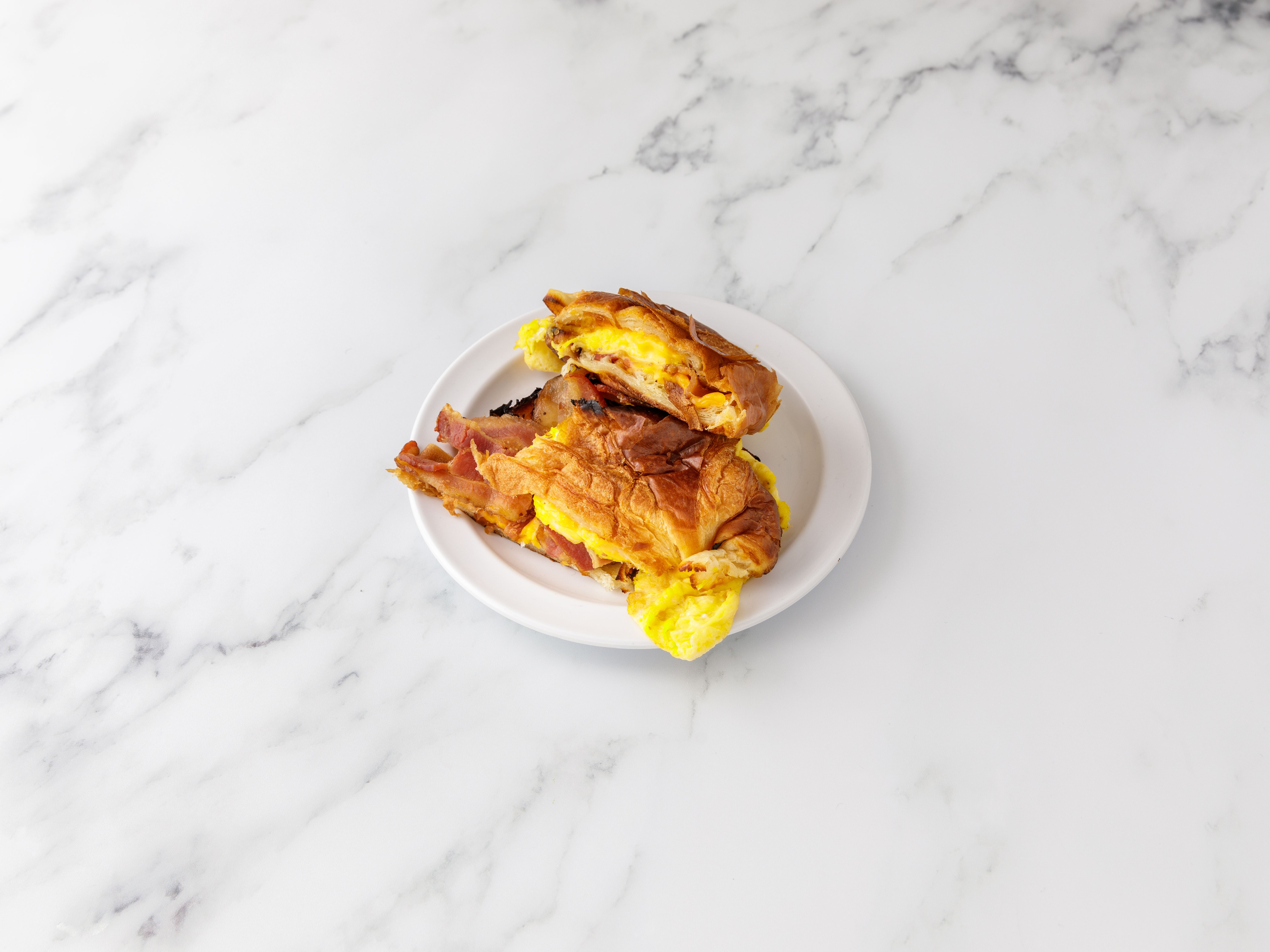 Order Breakfast on a Croissant food online from Cafe 82 store, New York on bringmethat.com
