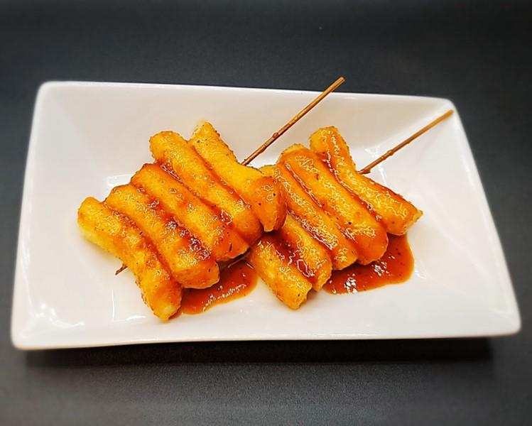 Order Fried Rice Cake (2pcs) # food online from Honey Dress Fried Chicken store, Torrance on bringmethat.com