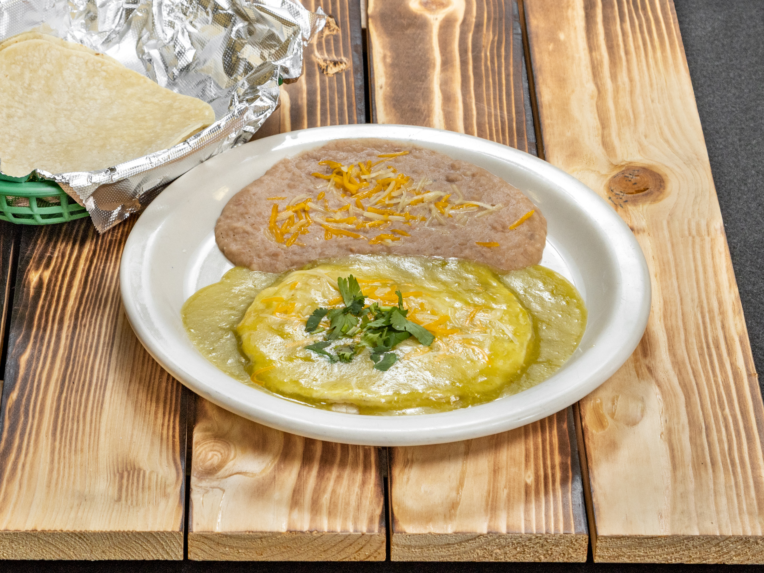 Order Huevos Rancheros Breakfast food online from Restaurant Y Tacos El Chino store, Dallas on bringmethat.com