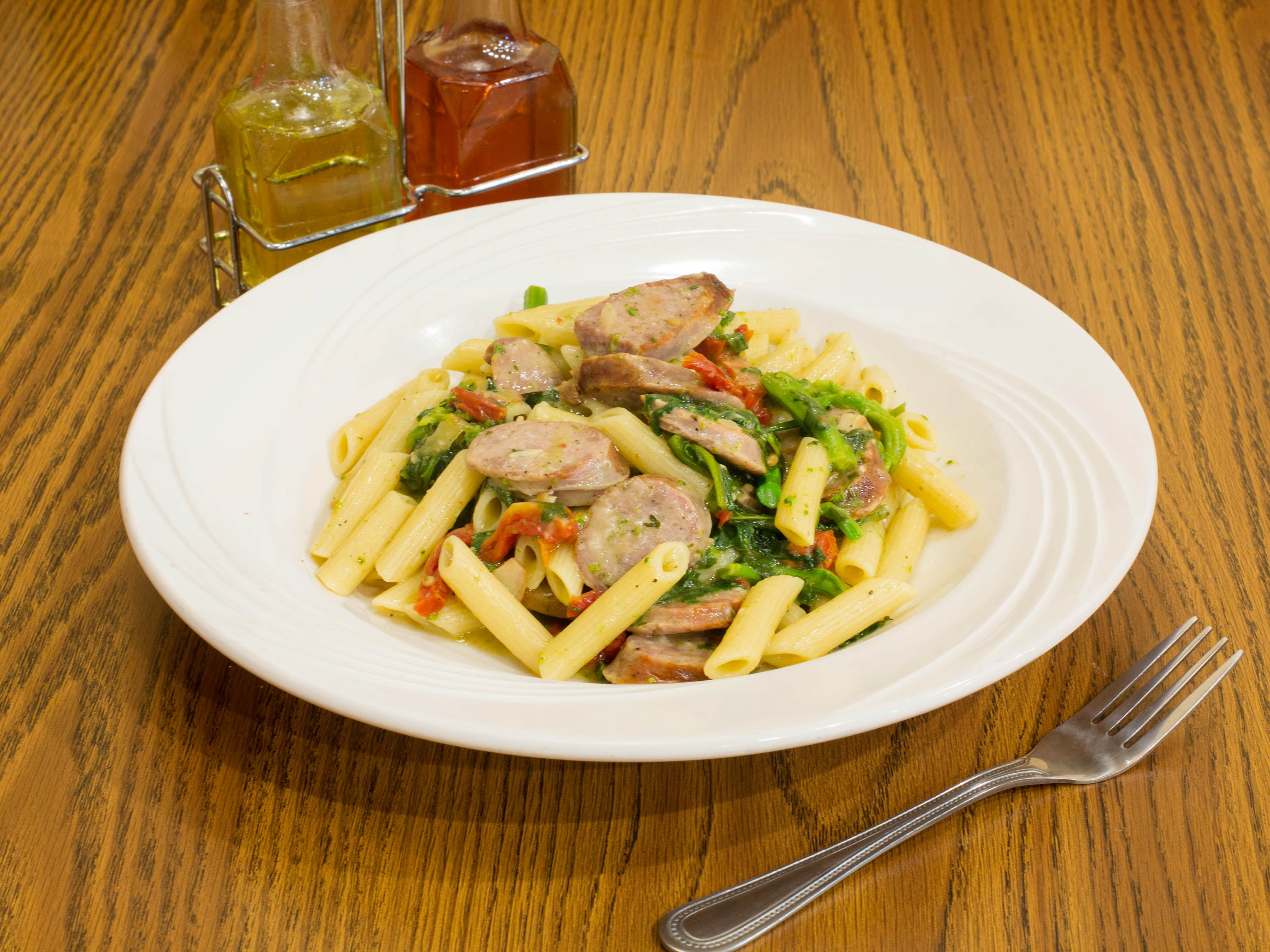 Order Penne Calabrese food online from Puzo Family Restaurant store, North Haledon on bringmethat.com