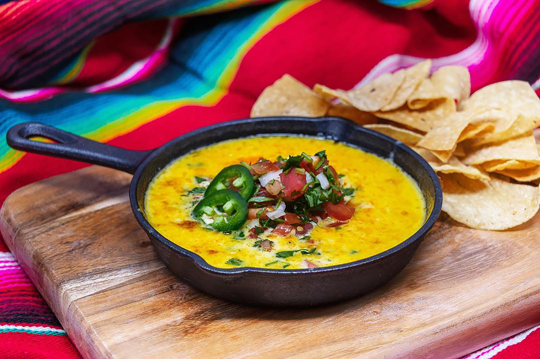 Order Queso Fundido food online from Little Onion Mexican Restaurant store, Santa Ana on bringmethat.com