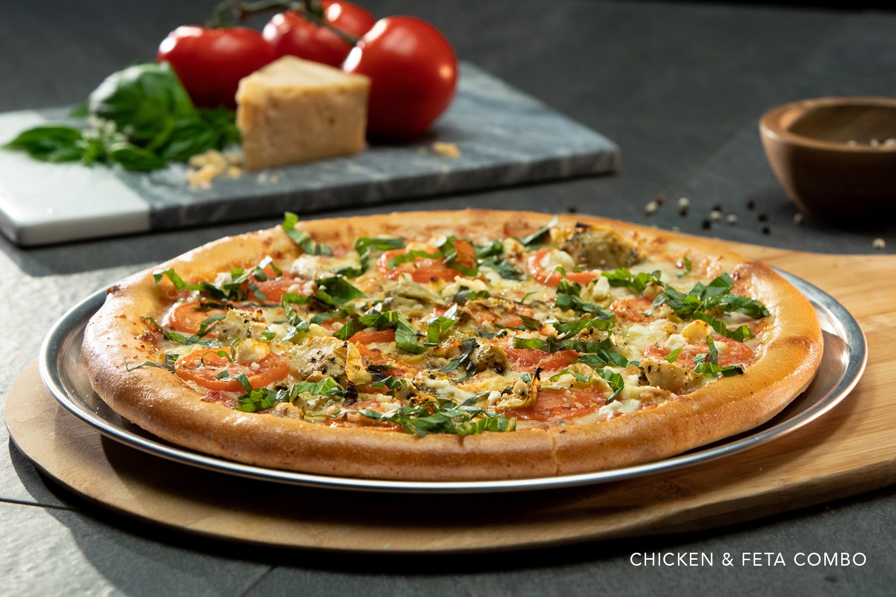 Order Chicken & Feta Combo Pizza - Medium 12'' (6 Slices) food online from Zio Pizzeria - store, Omaha on bringmethat.com