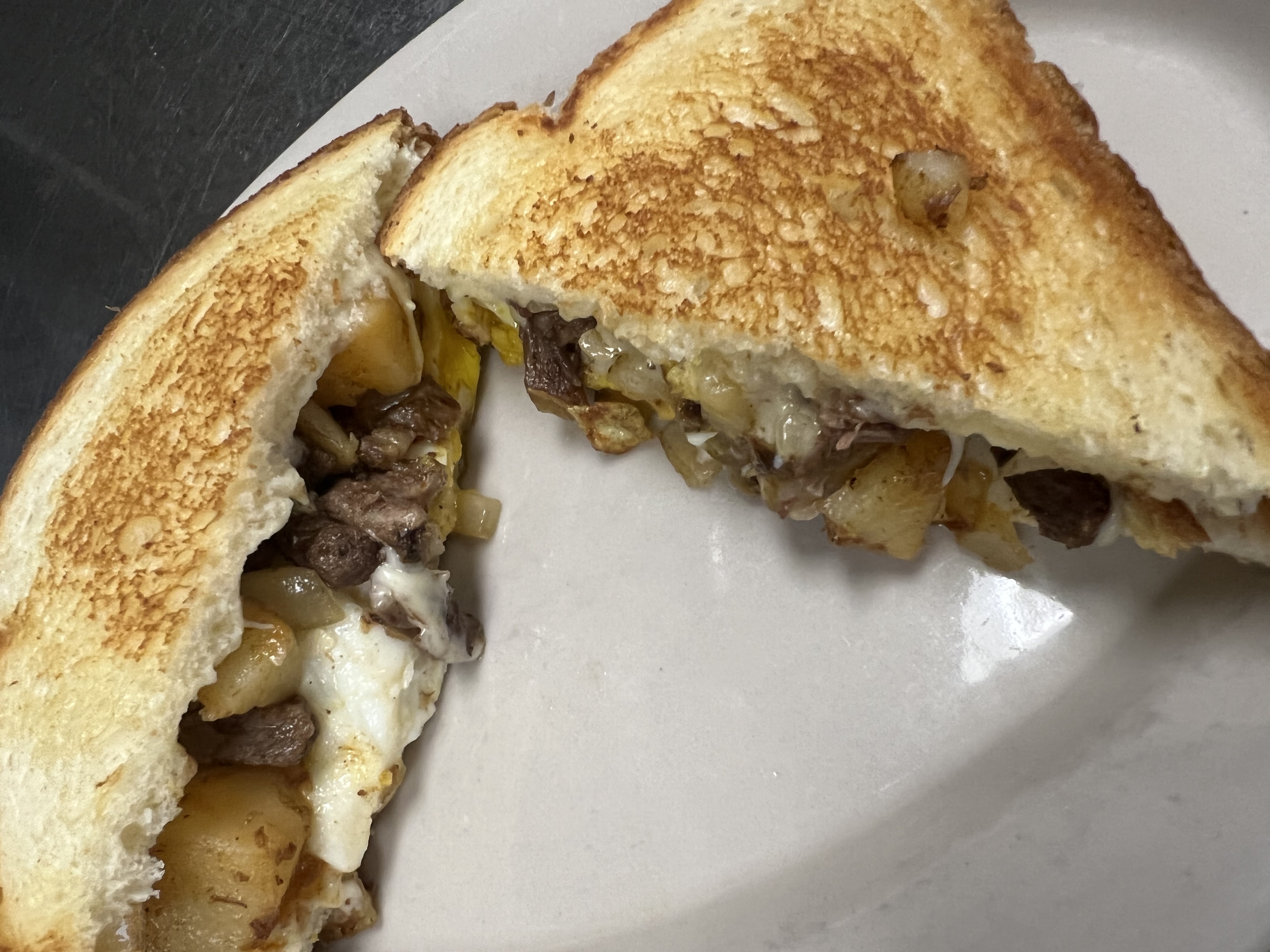 Order Short Rib Hash, 2 Eggs and Cheese Sandwich food online from The Mystic Diner & Restaurant store, Stonington on bringmethat.com