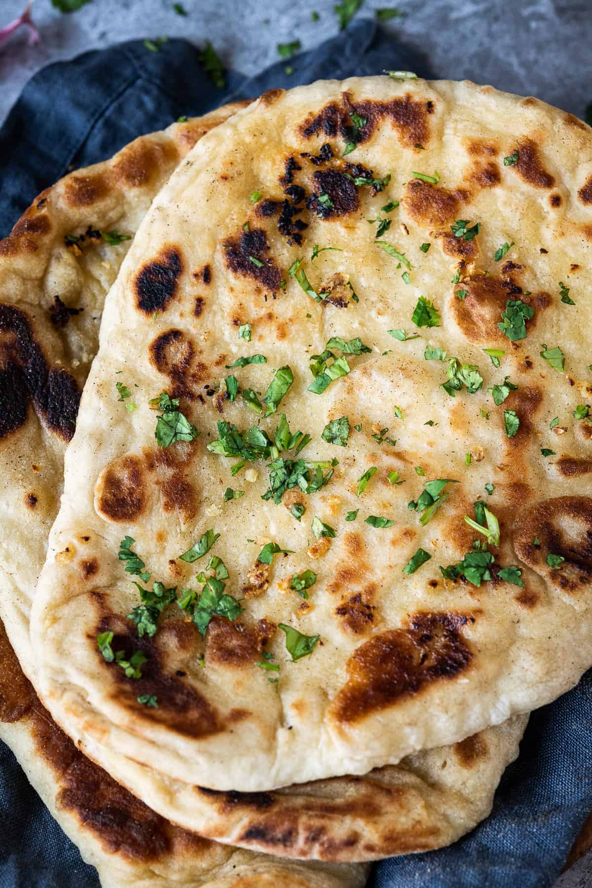 Order 81. Garlic Naan food online from Desi Spice store, Grand Rapids on bringmethat.com