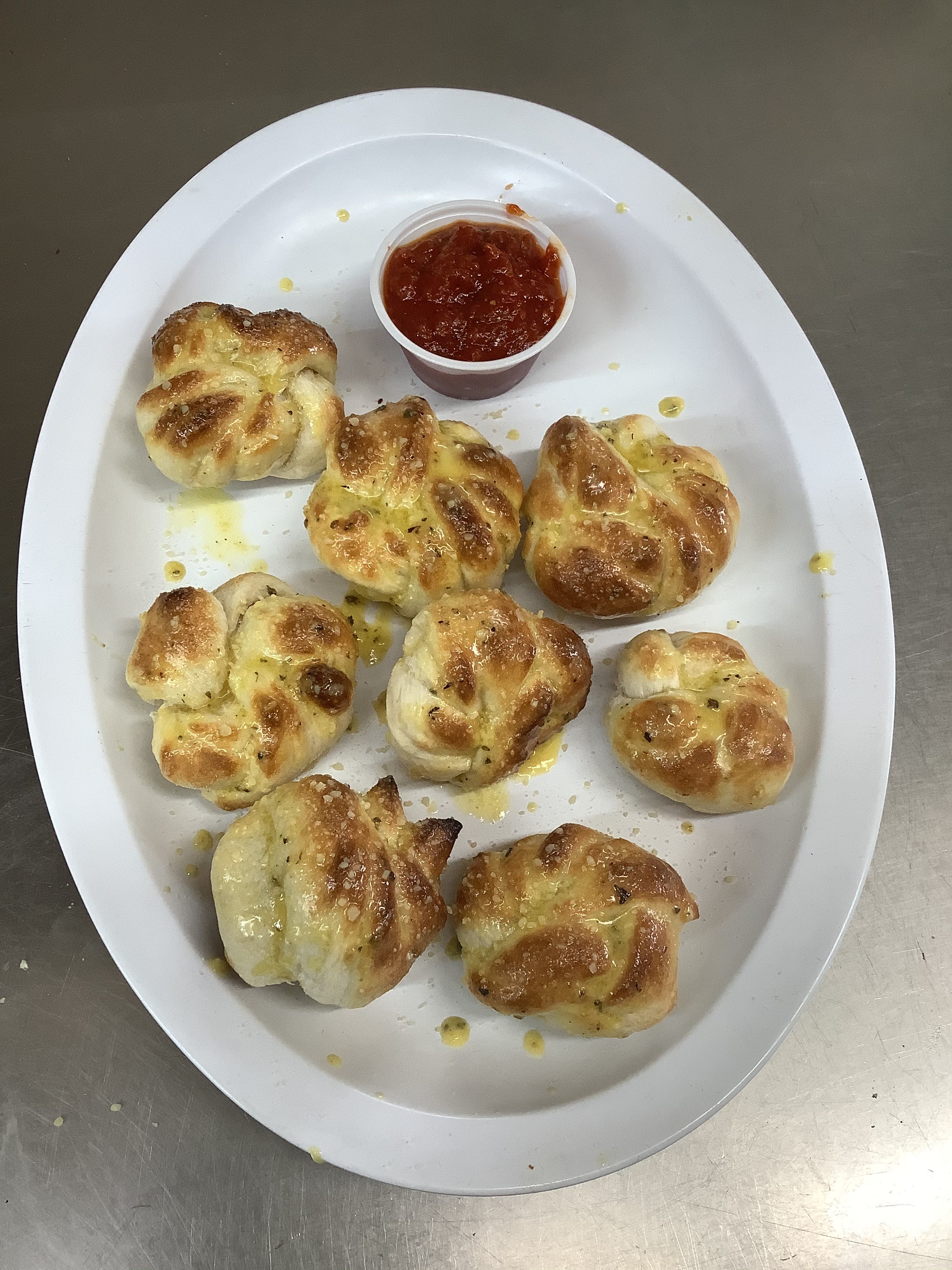 Order Garlic Knots - 8 Pieces food online from Philly Grill - Diane Ave store, San Diego on bringmethat.com