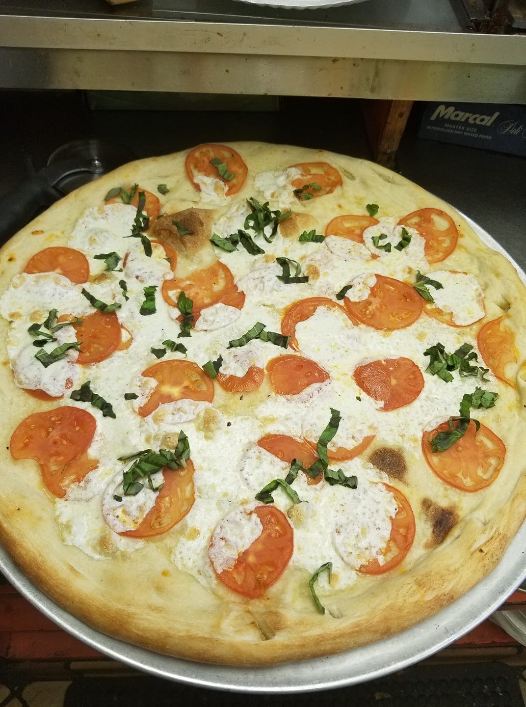 Order Margarita Pizza - Small 12'' (6 Cut) food online from Capri Pizzeria & Restaurant store, Lake George on bringmethat.com