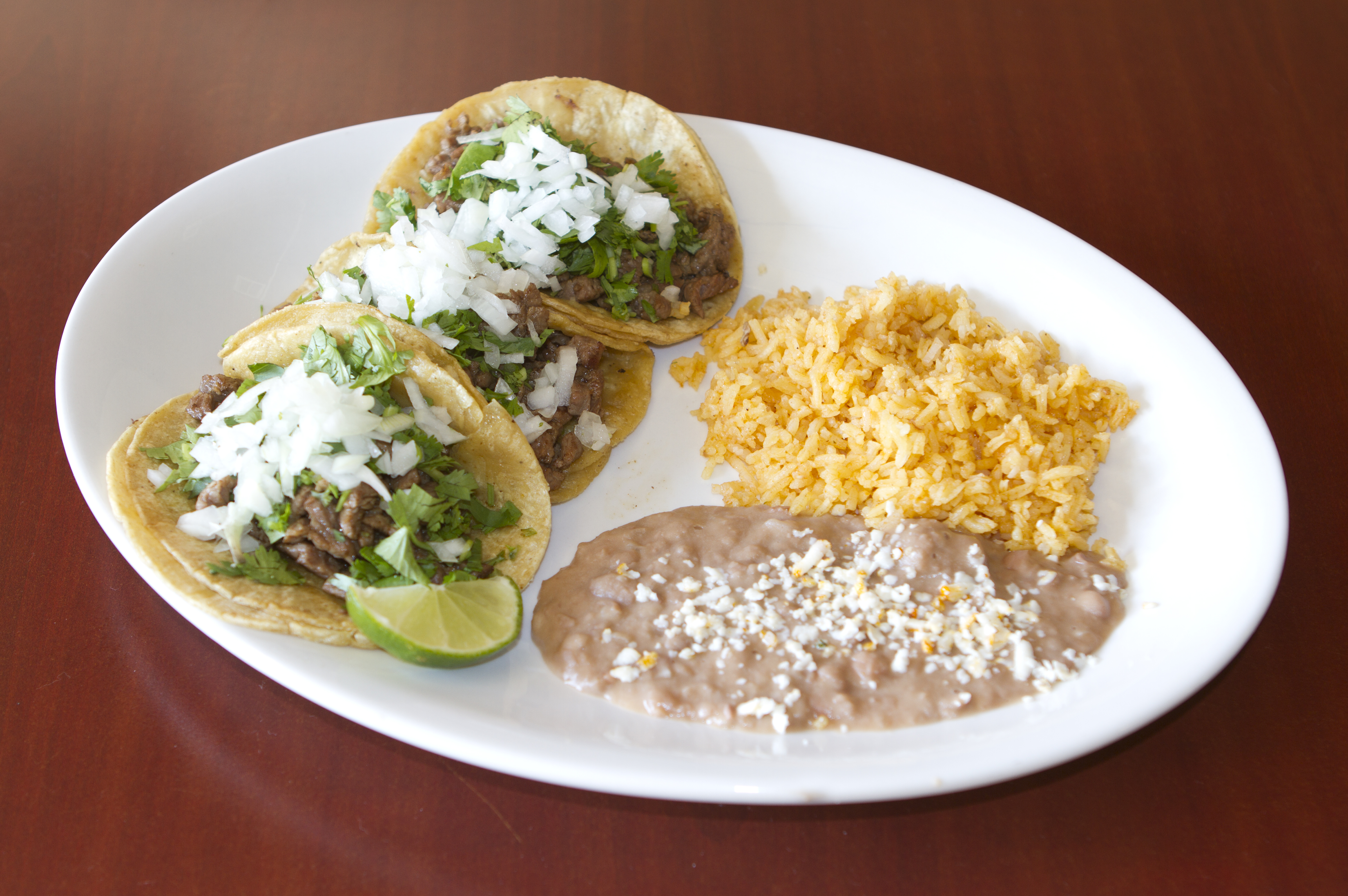 Order 5. Three Tacos Dinner Plate with Meat food online from El Diamante Azul store, Chicago on bringmethat.com