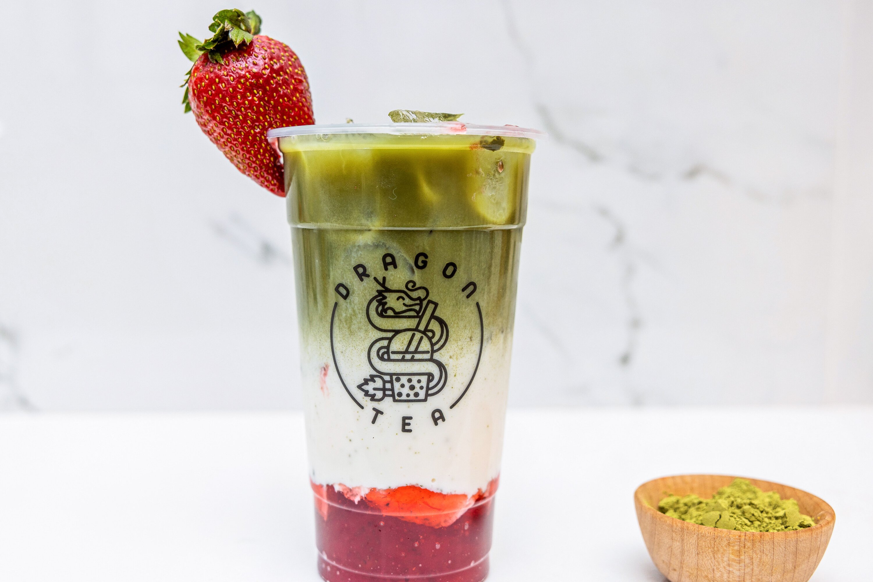 Order Strawberry Matcha Latte Iced  food online from Dragon Tea store, New York on bringmethat.com