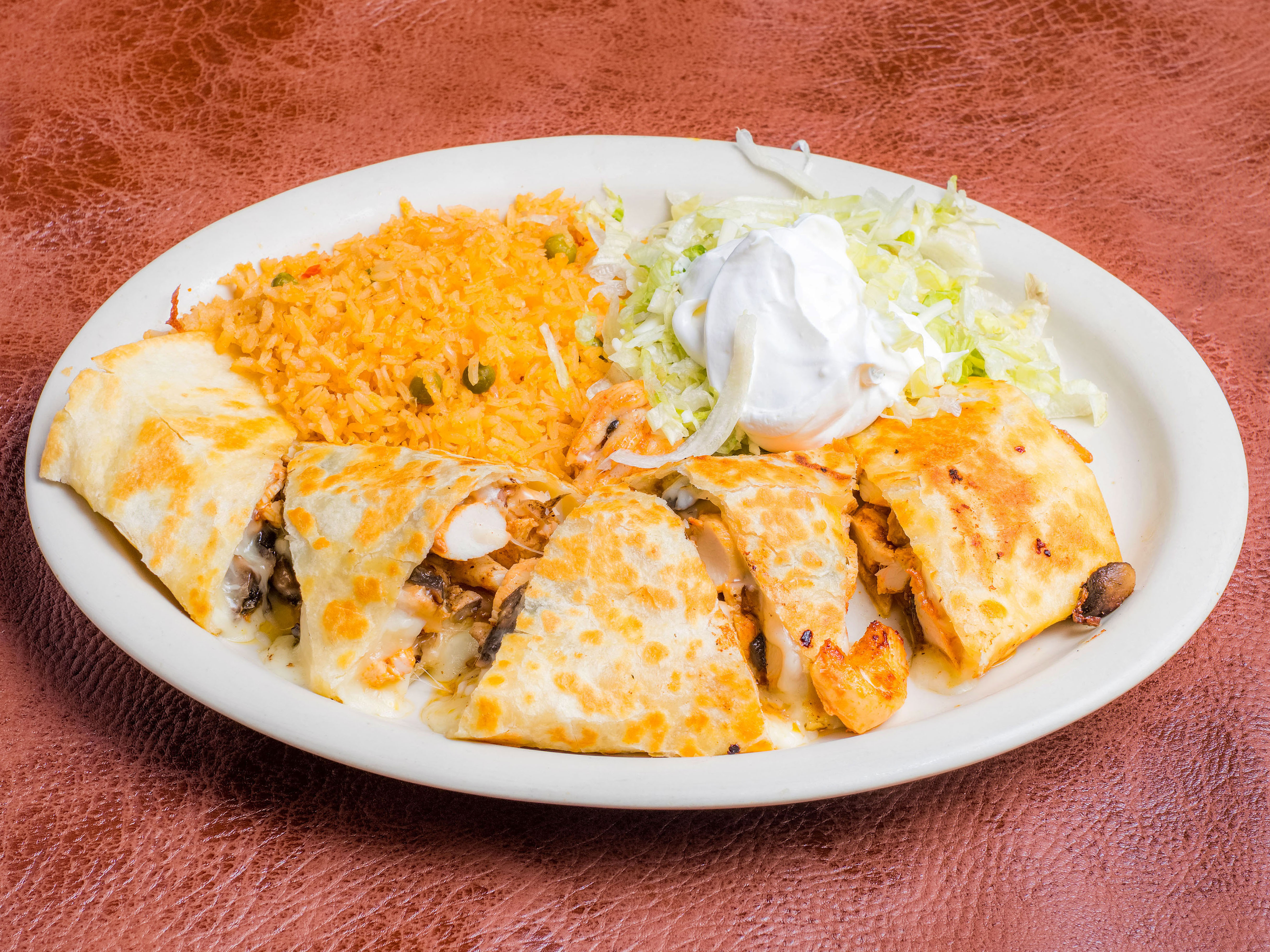 Order Chicken and Mushroom Quesadilla food online from Chile Verde store, Indianapolis on bringmethat.com
