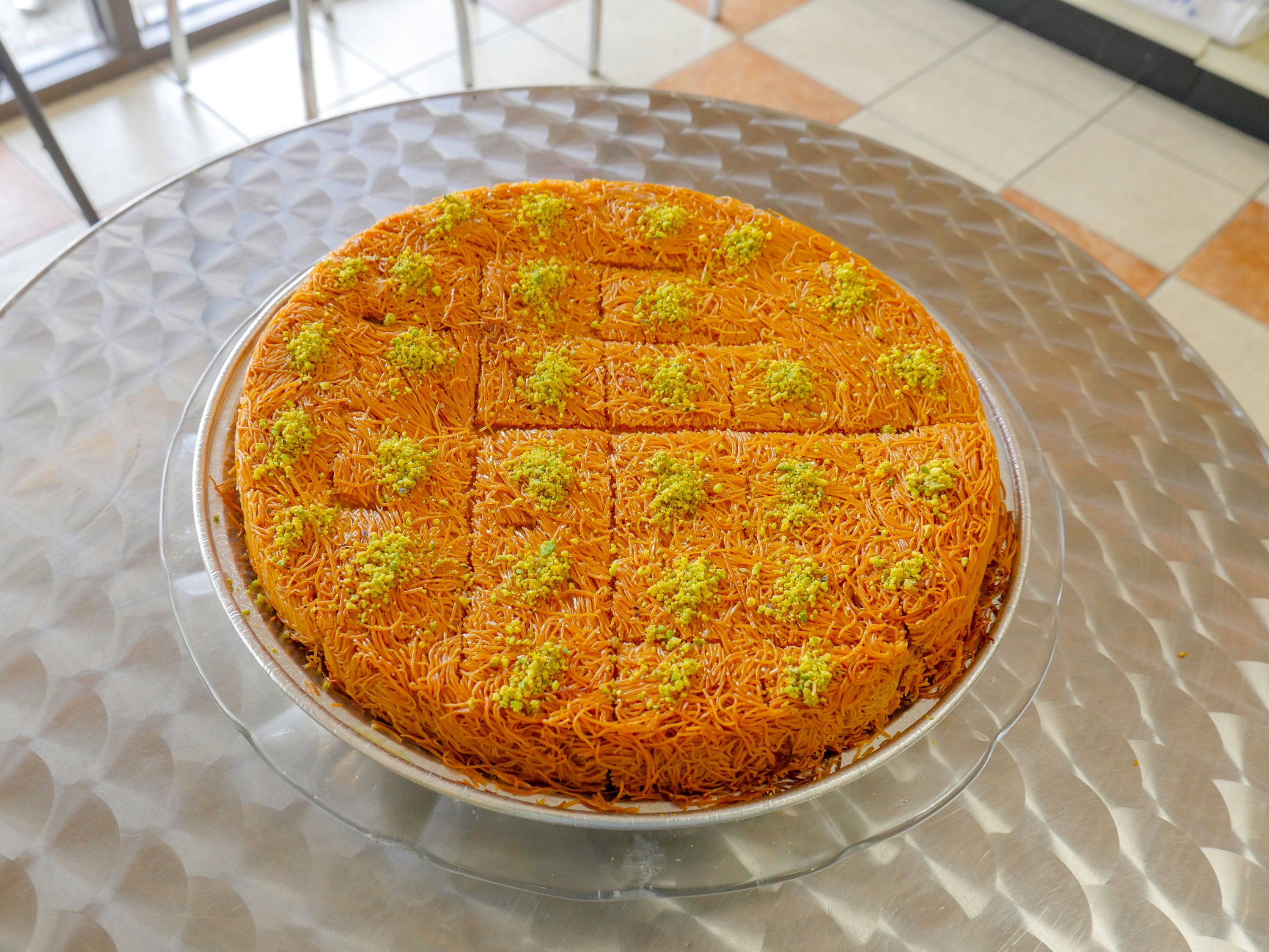 Order Knafeh Ashtah Platter large size / Knafeh cake filled with cream food online from Zaatar Factory Bakery store, Burbank on bringmethat.com