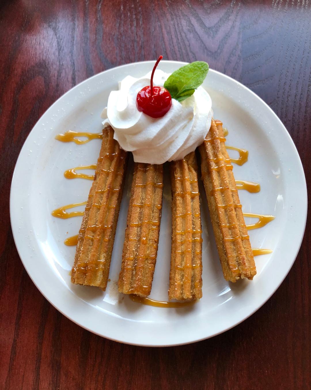 Order 4 Pieces Churros food online from Chavelo's Mexican Bar & Grill store, Henderson on bringmethat.com