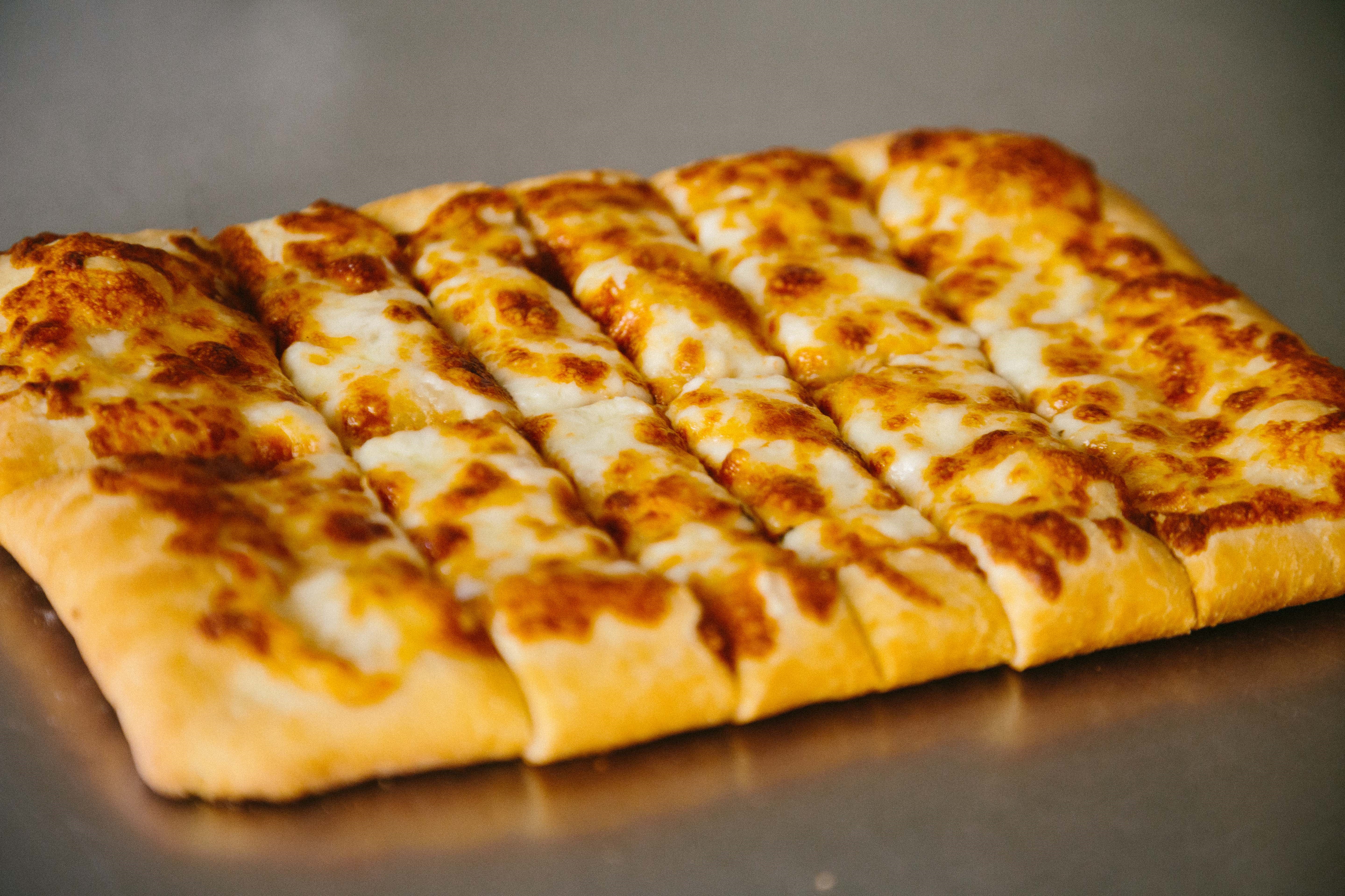 Order Cheesy Garlic Bread Sticks food online from Pisa Pizza store, Countryside on bringmethat.com