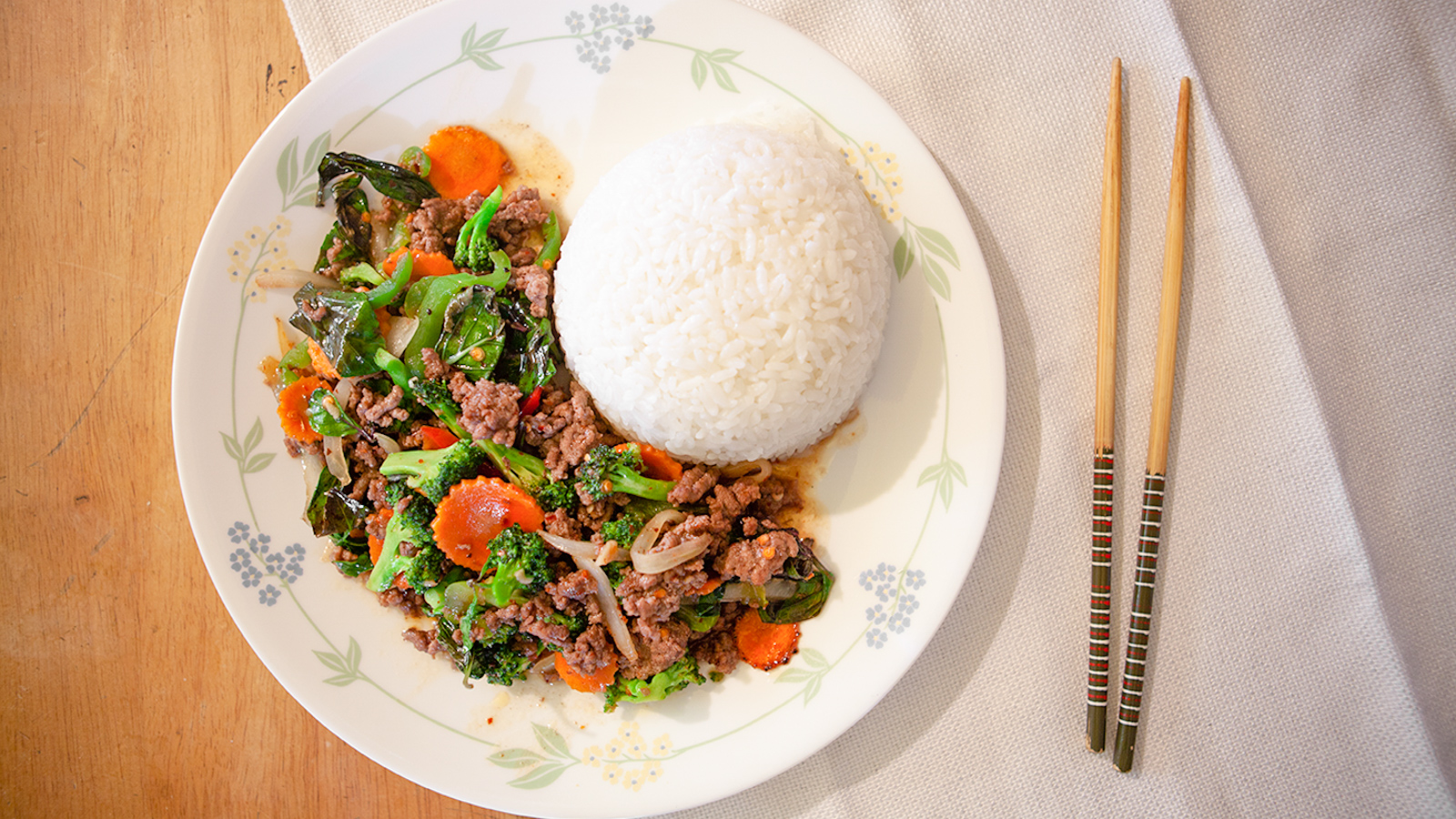 Order R5. Spicy Basil with Beef over Rice food online from Thai2eat store, Bakersfield on bringmethat.com