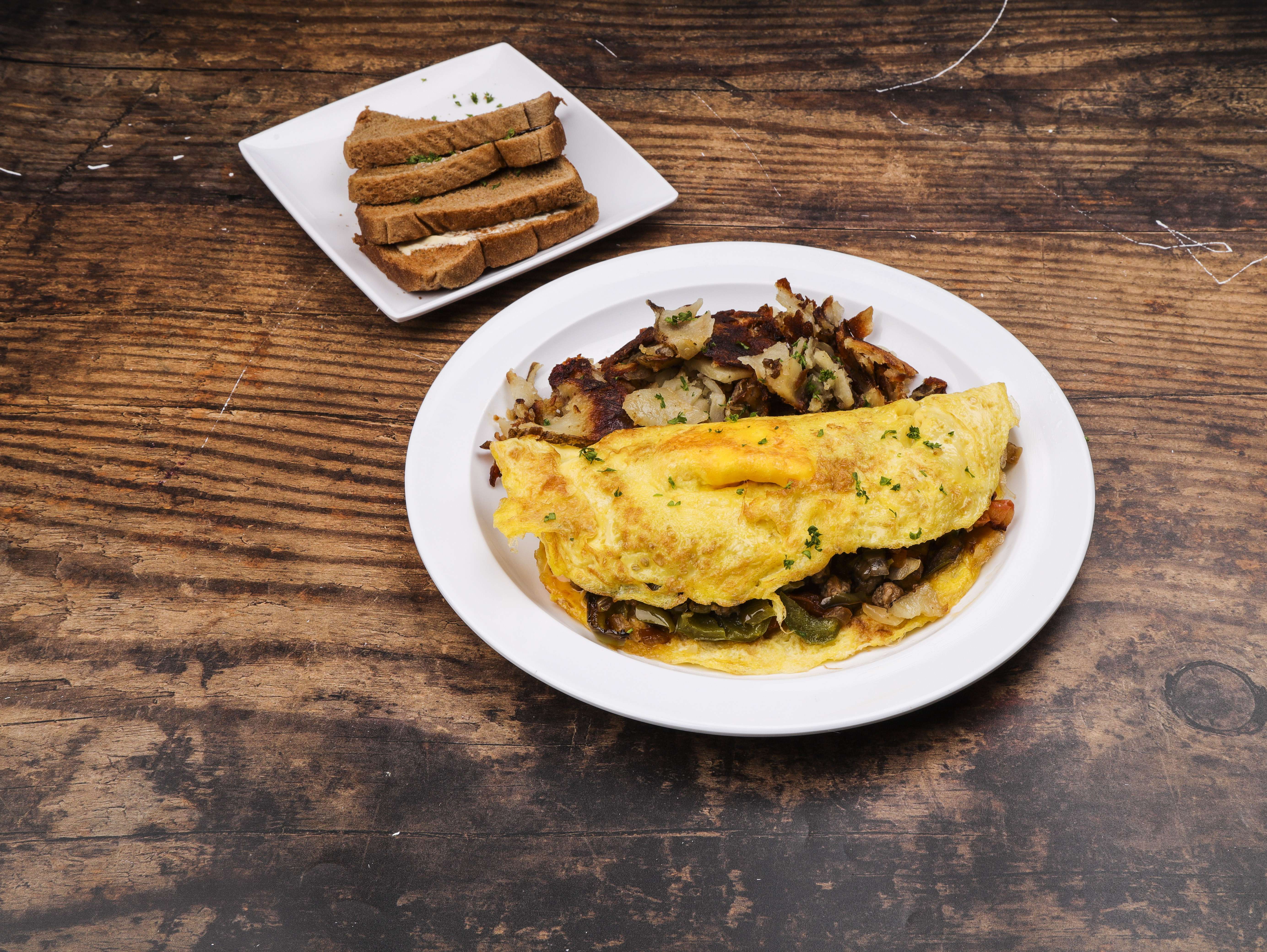 Order Mexican Breakfast Omelette food online from Sam's Diner store, Maumee on bringmethat.com