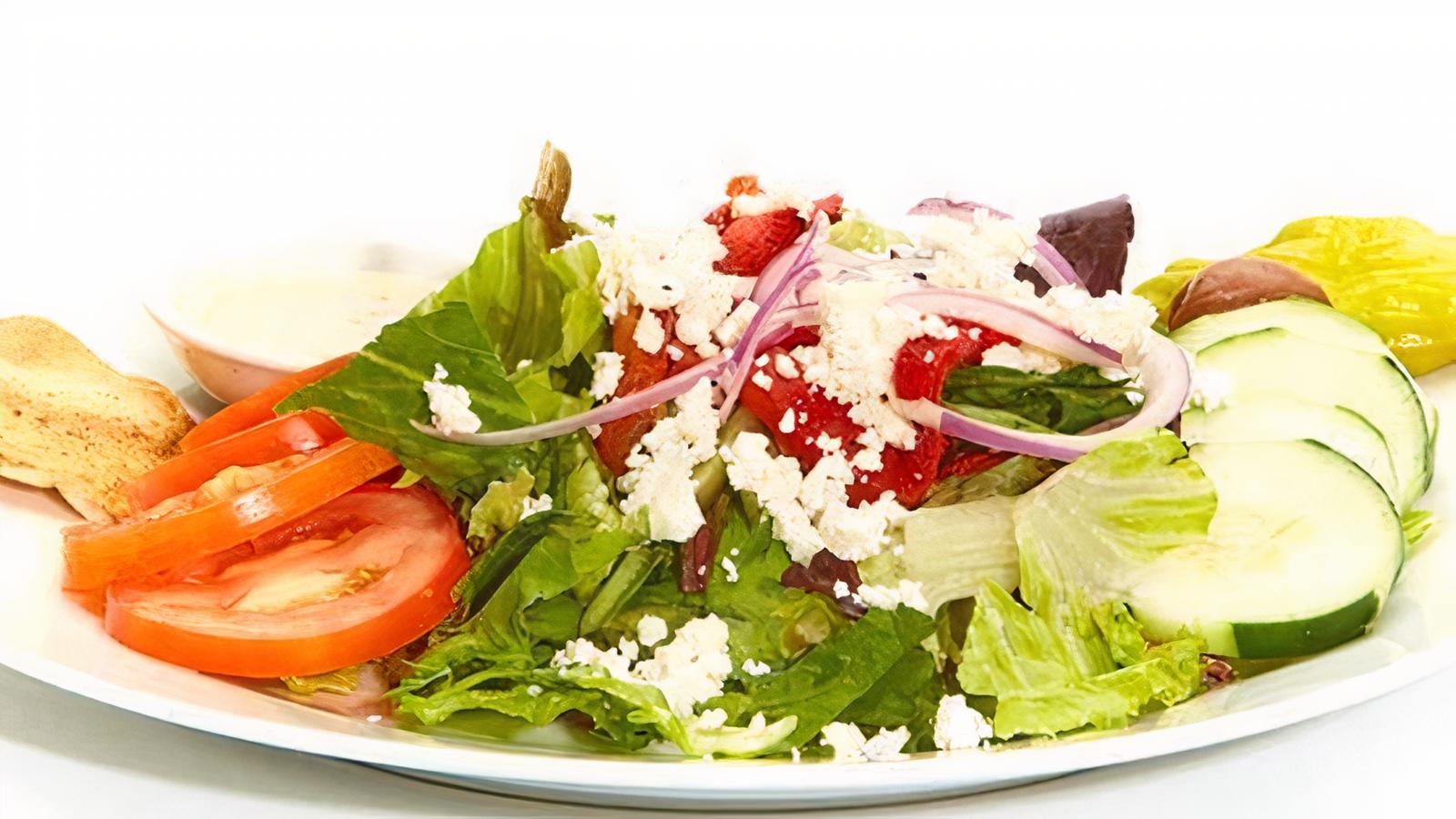 Order Greek Salad food online from Taziki Cafe store, Tuscaloosa on bringmethat.com