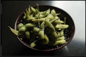 Order Edamame (Green Soybean) food online from Aki Sushi & Japanese Fusion store, San Jacinto on bringmethat.com