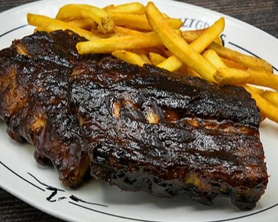 Order BBQ Pork Ribs food online from Saltgrass Steakhouse store, Plano on bringmethat.com