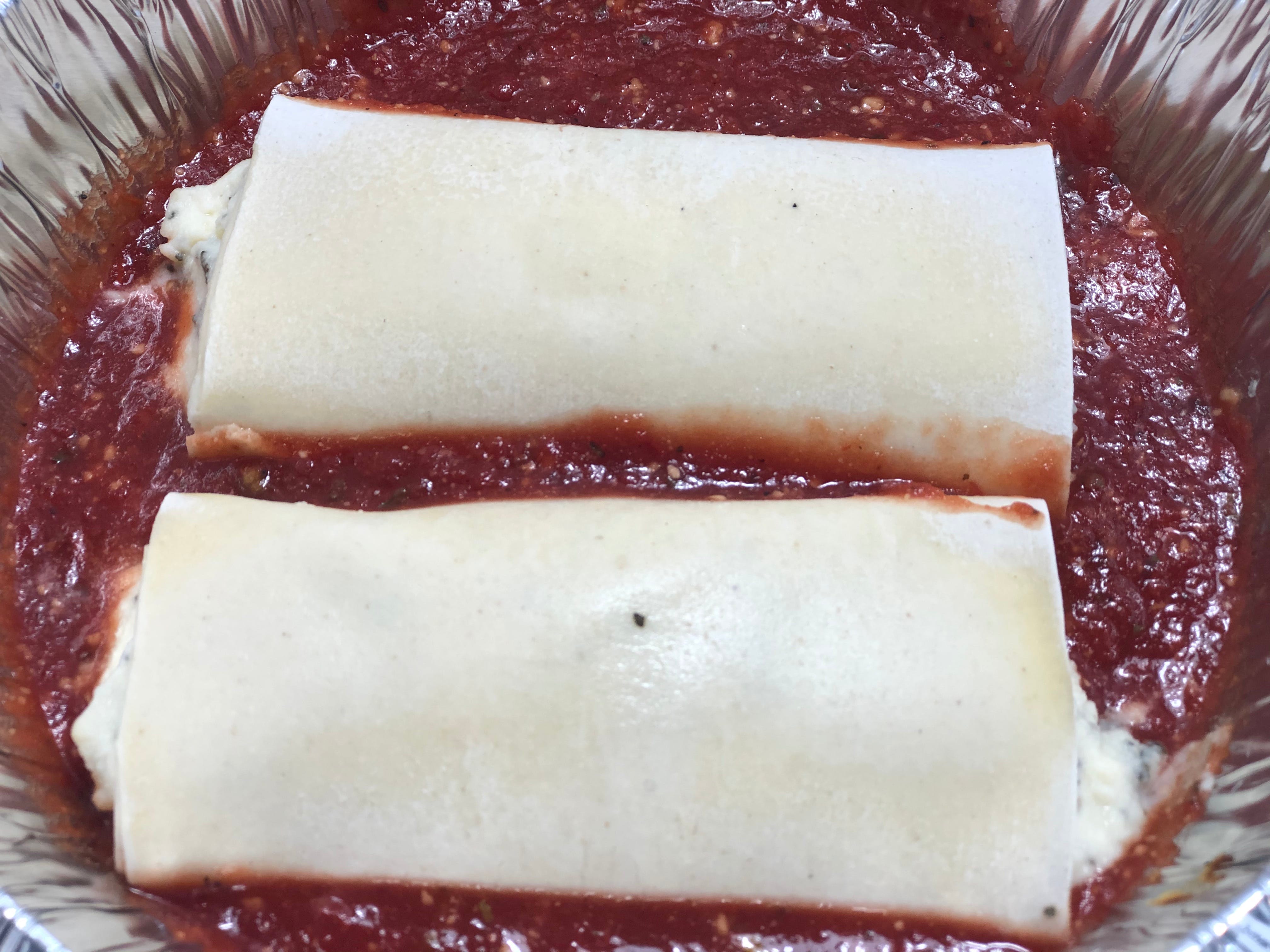 Order Manicotti - Dinner food online from Lombardo Pizza store, Wyoming on bringmethat.com