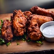 Order Spicy Chicken Wings (12 pc) food online from Afro Deli store, Minneapolis on bringmethat.com