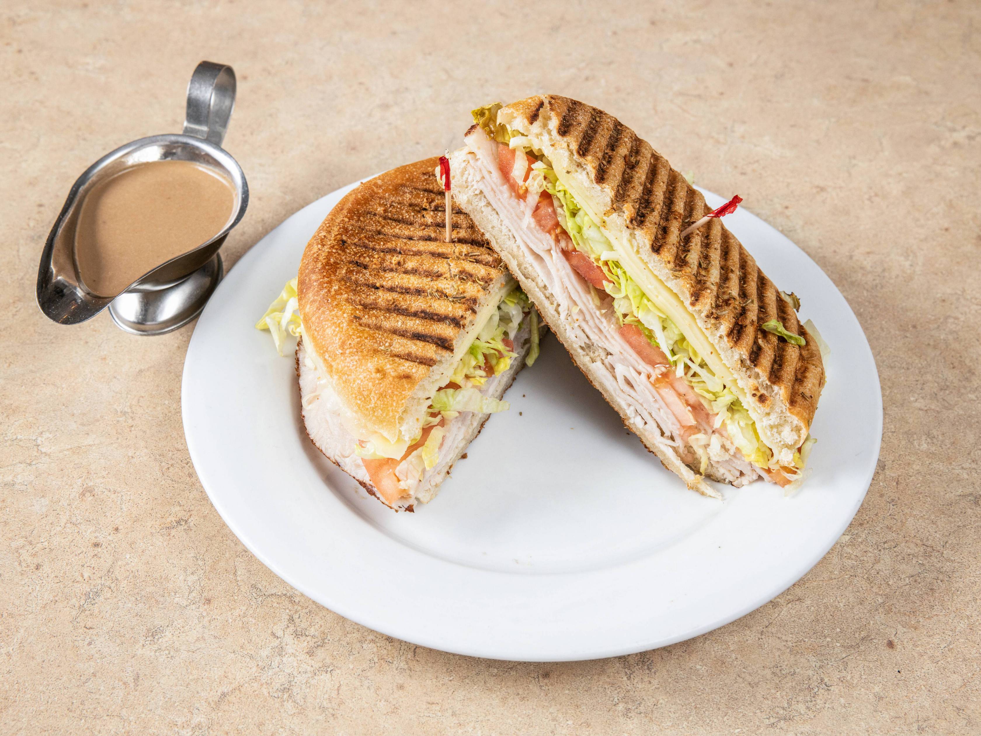 Order Tacchino Panini food online from Frank's Trattoria store, Caldwell on bringmethat.com