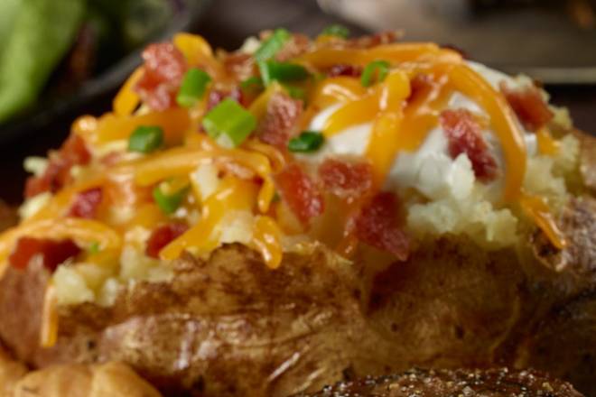 Order LOADED BAKED POTATO food online from 54th Street Grill & Bar - store, St. Louis on bringmethat.com