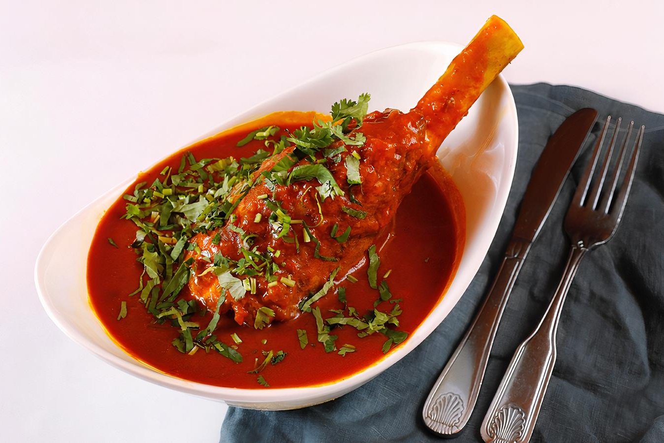 Order Lamb Shank food online from Mission Curry House store, San Francisco on bringmethat.com