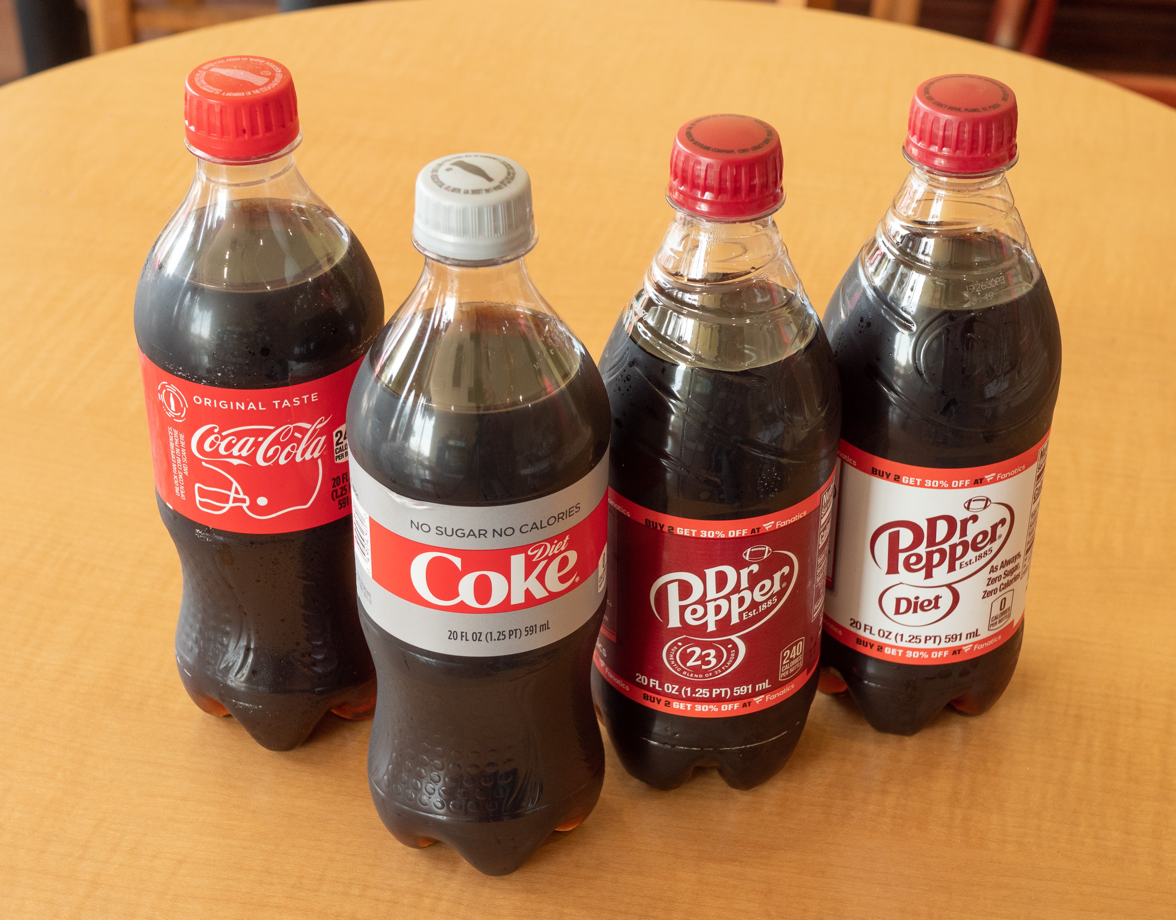 Order 20 oz. Bottled Soda food online from Sara Donuts store, Euless on bringmethat.com