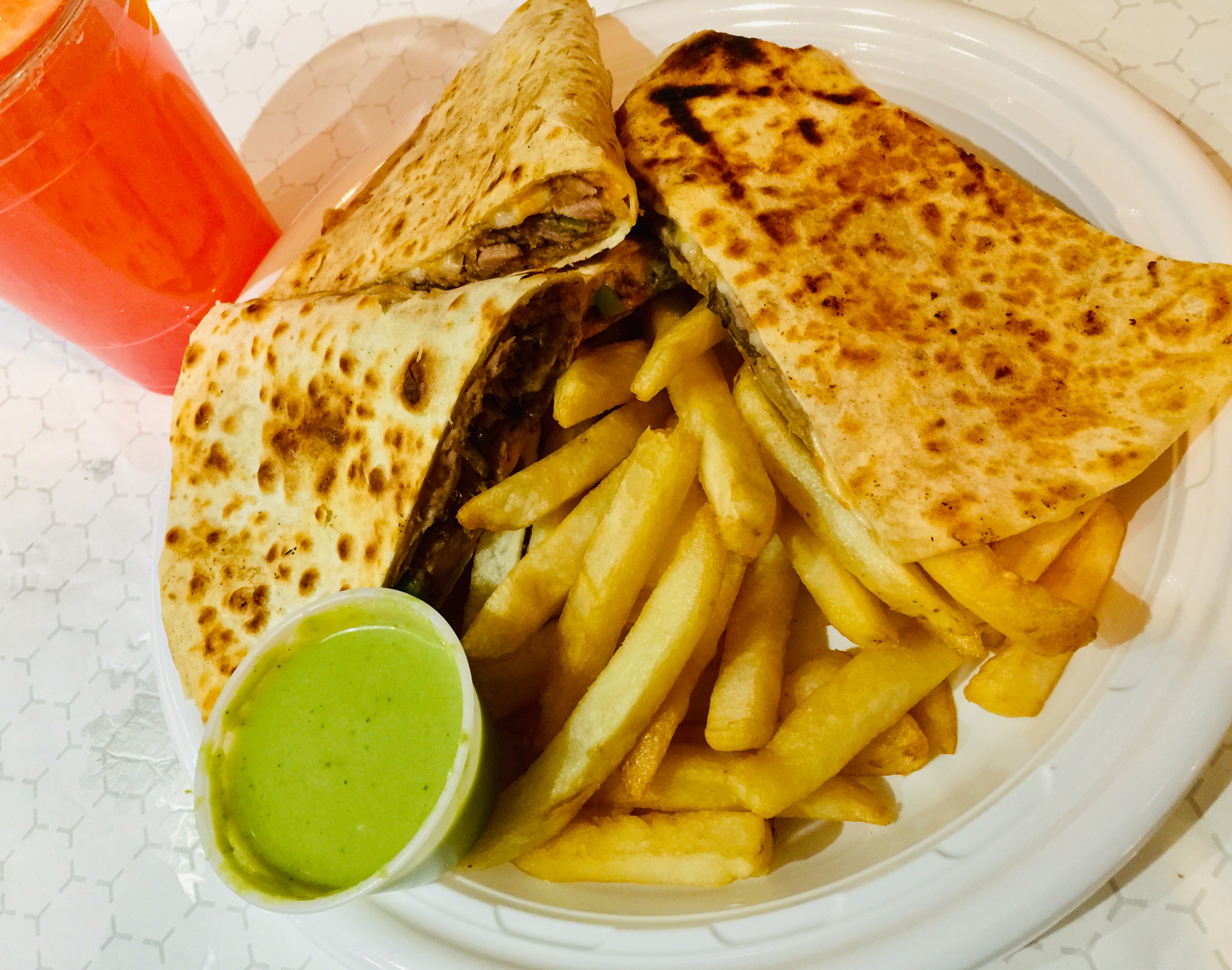 Order Deluxe Pork Quesadilla food online from Tio Pio - Willoughby St. store, Brooklyn on bringmethat.com