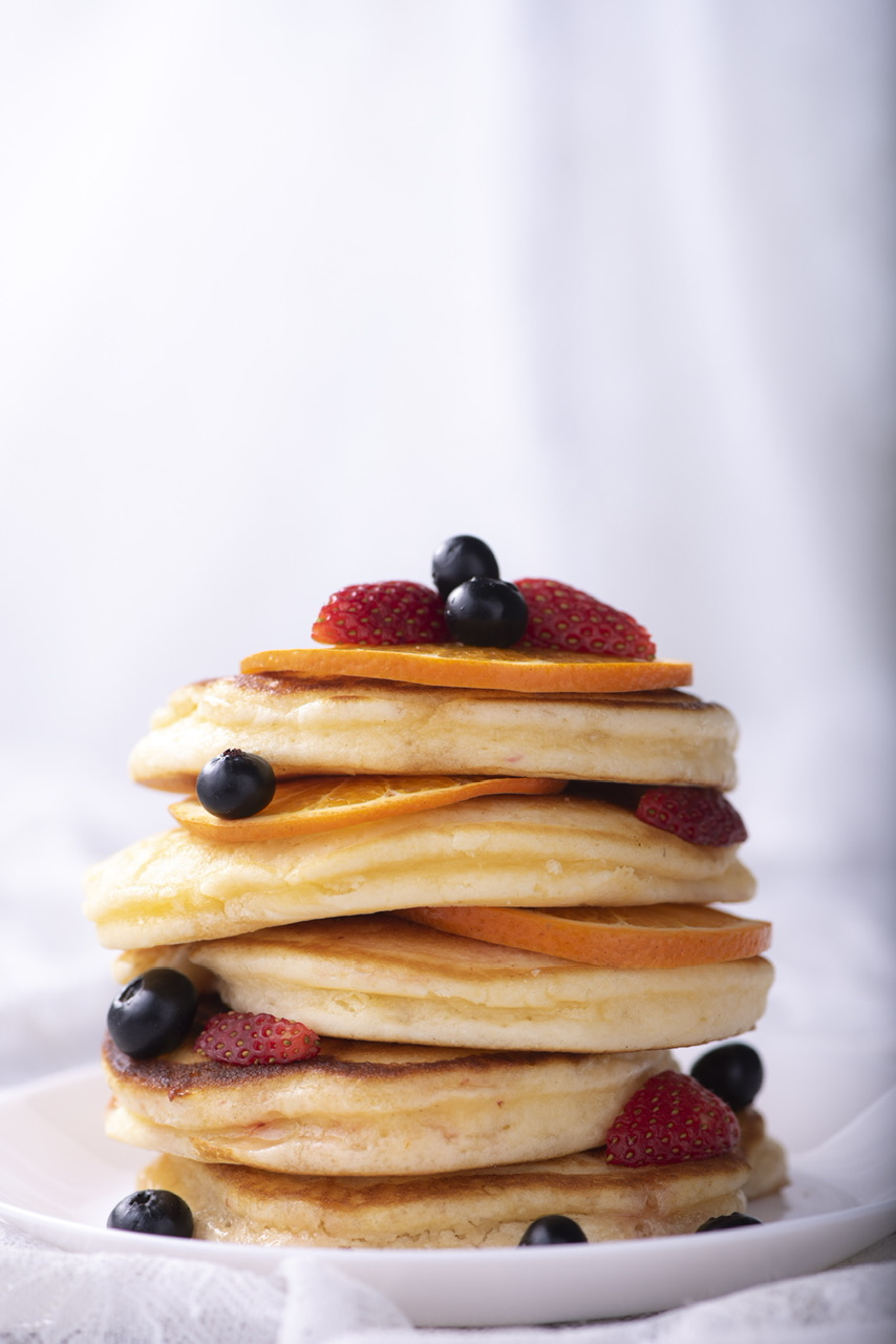 Order  3 Buttermilk Pancakes with fresh strawberry  food online from 5 brothers gourmet deli store, New York on bringmethat.com