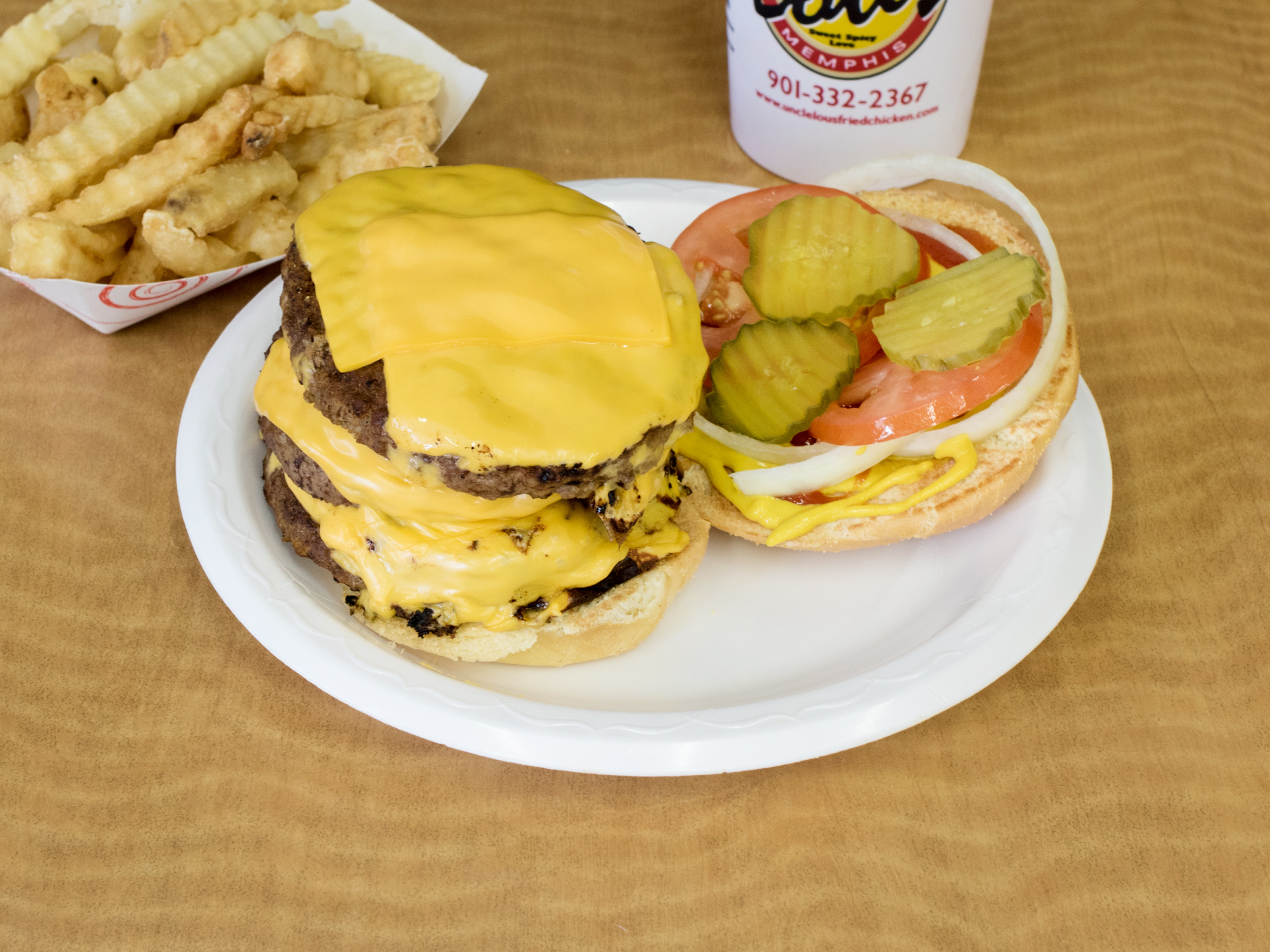Order 1 lb. Monster Cheeseburger Combo food online from Uncle Lous Fried Chicken and Stuff store, Memphis on bringmethat.com