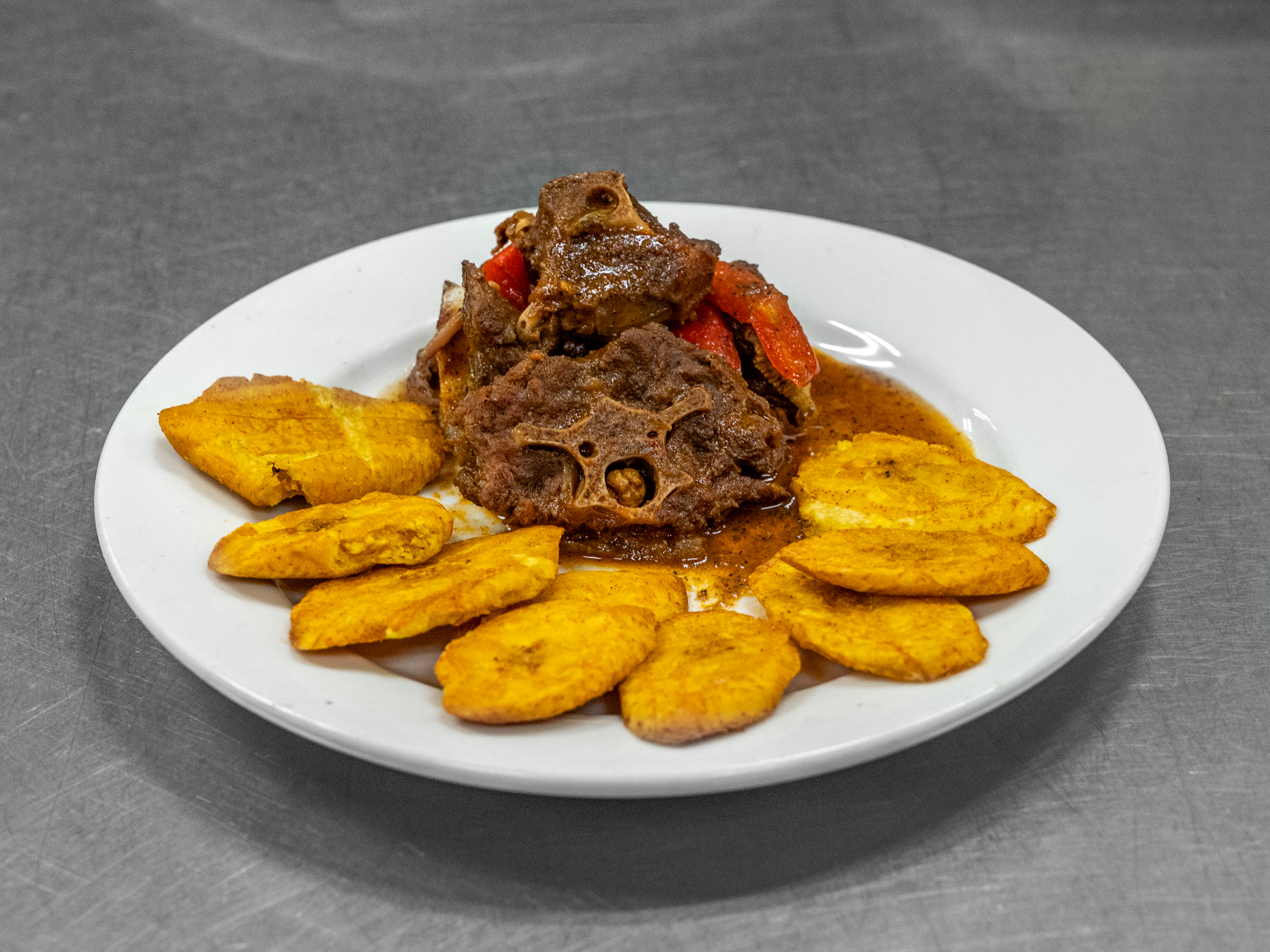 Order Stewed Oxtail/ Rabo Guisado food online from Tu Cocina Restaurant & Bakery store, Lawrence on bringmethat.com