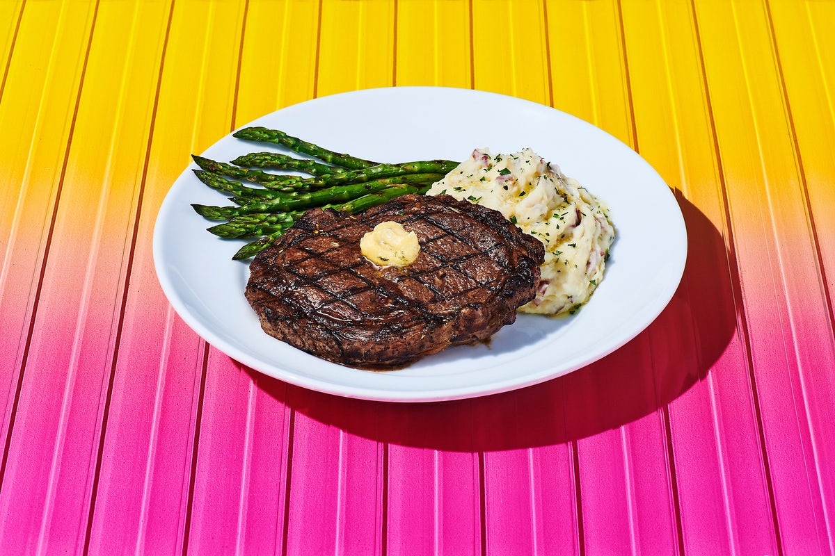 Order NEW! 14-oz. Ribeye* food online from Dave & Buster store, McDonough on bringmethat.com