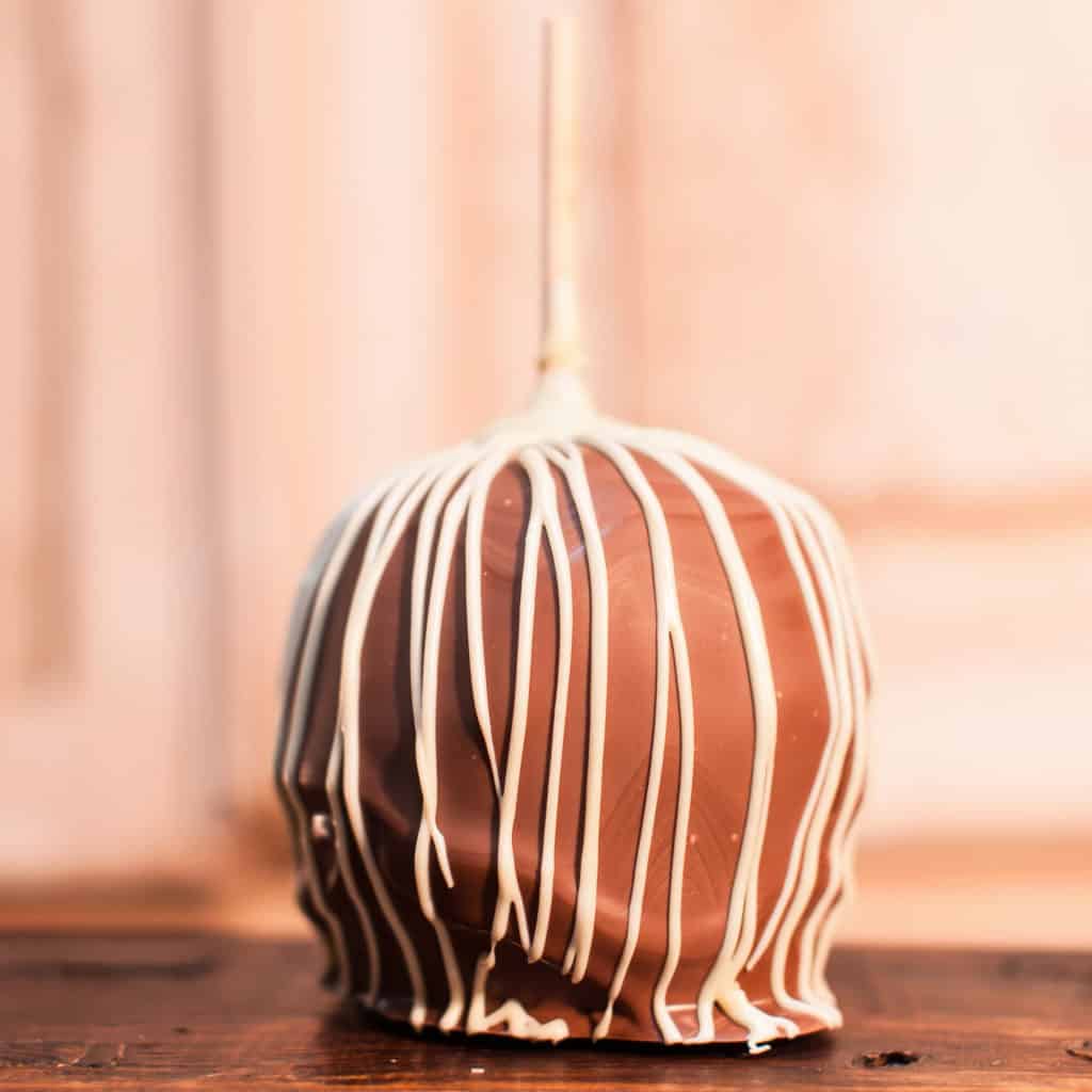 Order Brown Cow Caramel Apple food online from Candy Apple Shoppe store, Glenwood on bringmethat.com