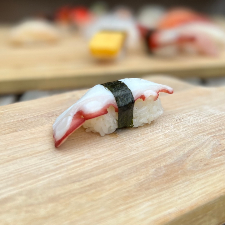 Order Tako Nigiri food online from Tanuki sushi store, Chicago on bringmethat.com