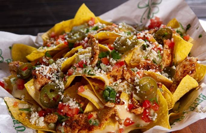 Order Chicken Loaded Nachos food online from Beef 'O' Brady's store, Floyds Knobs on bringmethat.com