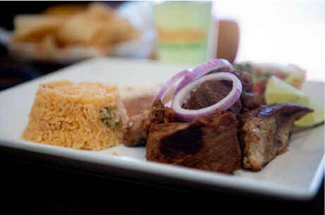Order Carnitas Michoacan food online from Frontera Mex-Mex Grill store, Loganville on bringmethat.com