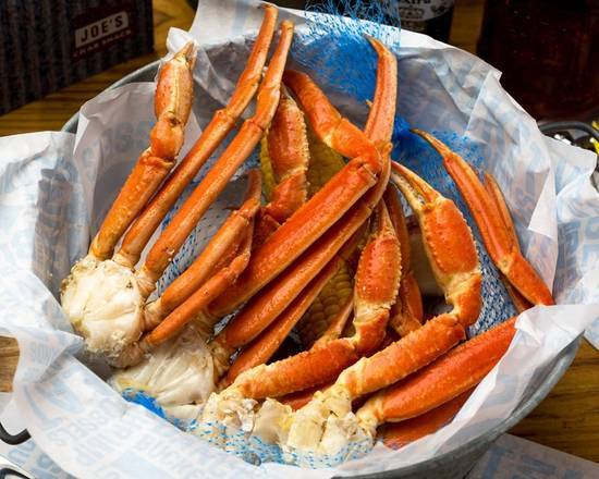 Order Snow Crab Bucket food online from Joes Crab Shack store, West Des Moines on bringmethat.com