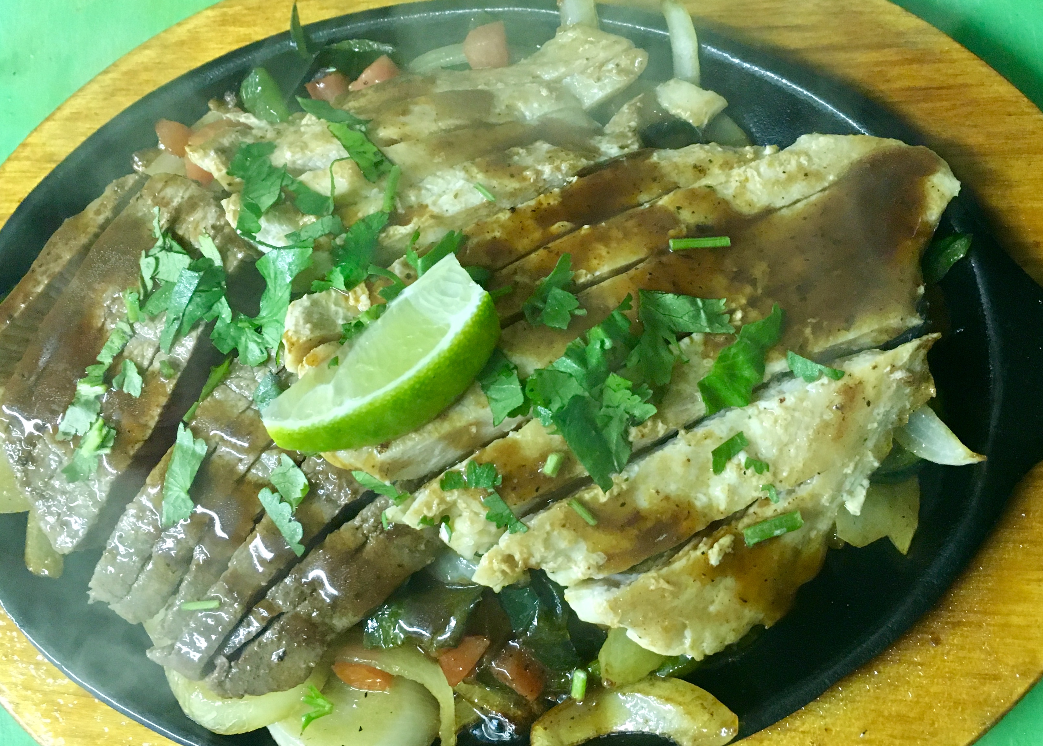 Order STEAK AND CHICKEN FAJITAS  food online from Paco Tacos store, Madison on bringmethat.com