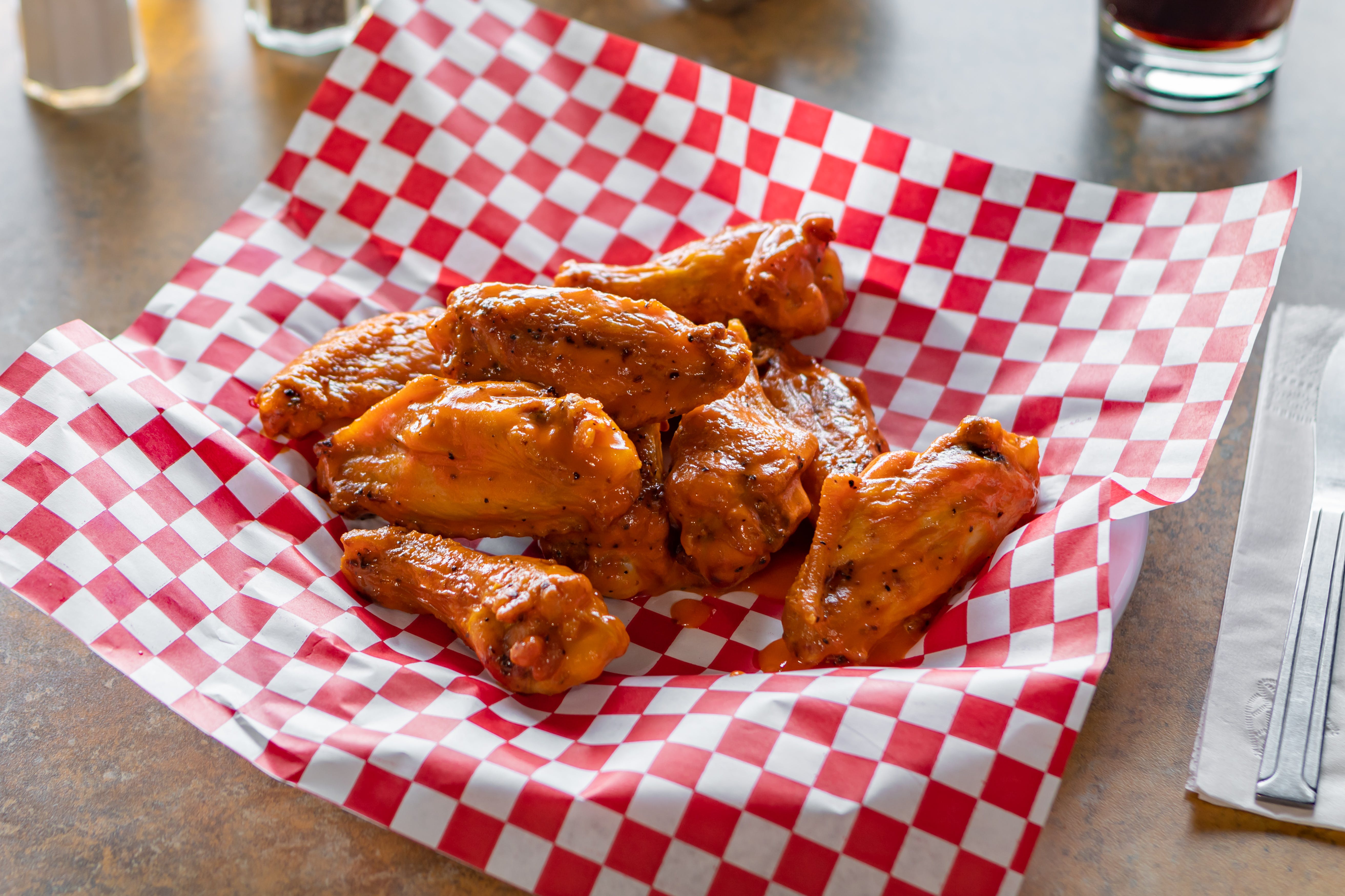 Order Jumbo Bone-In Chicken Wings - 10 Pieces food online from Saucy's Pizzeria store, Hillsboro on bringmethat.com