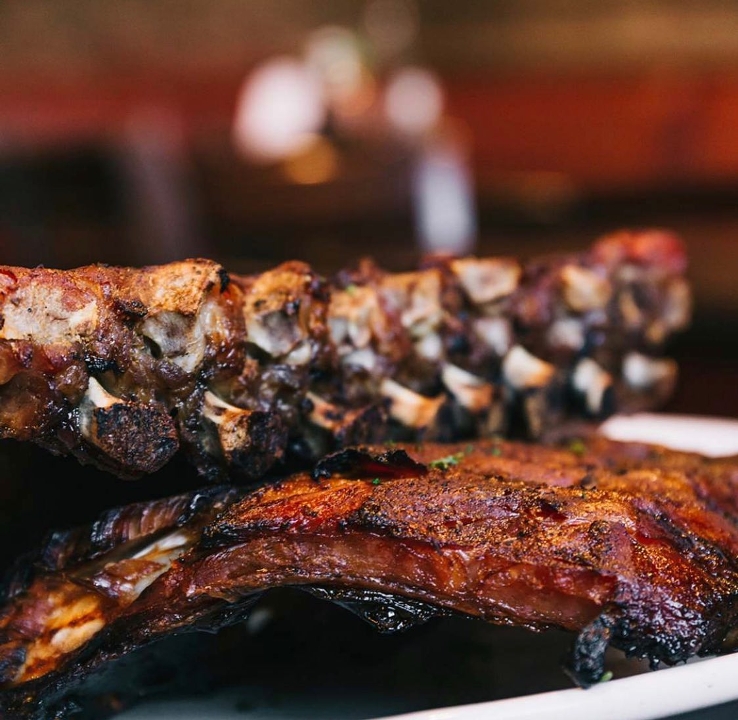 Order Pork Ribs food online from C.A.Y.A. Smoke House Grill store, Walled Lake on bringmethat.com