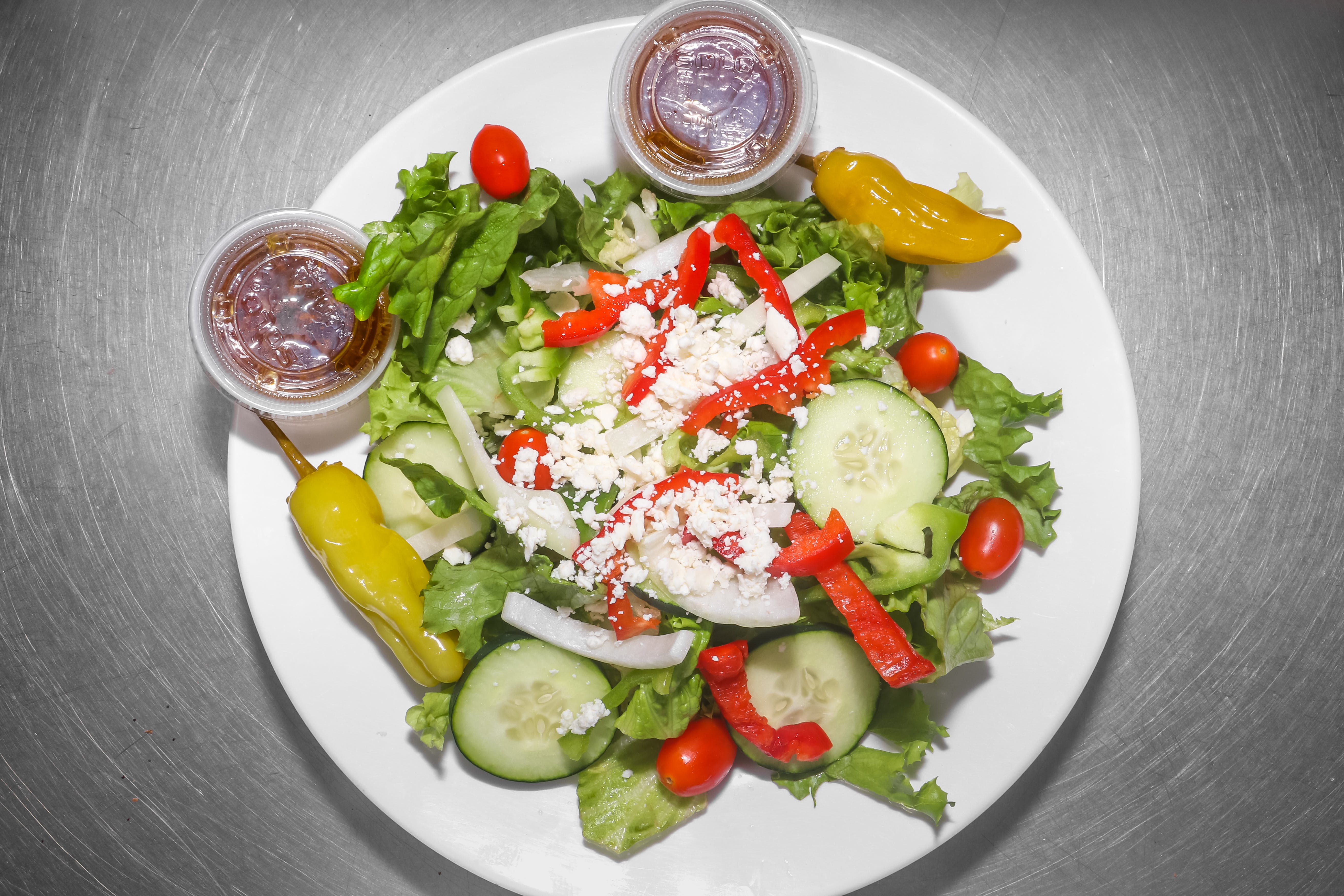Order Greek Salad - Small food online from Pizza Parlor store, Pearland on bringmethat.com