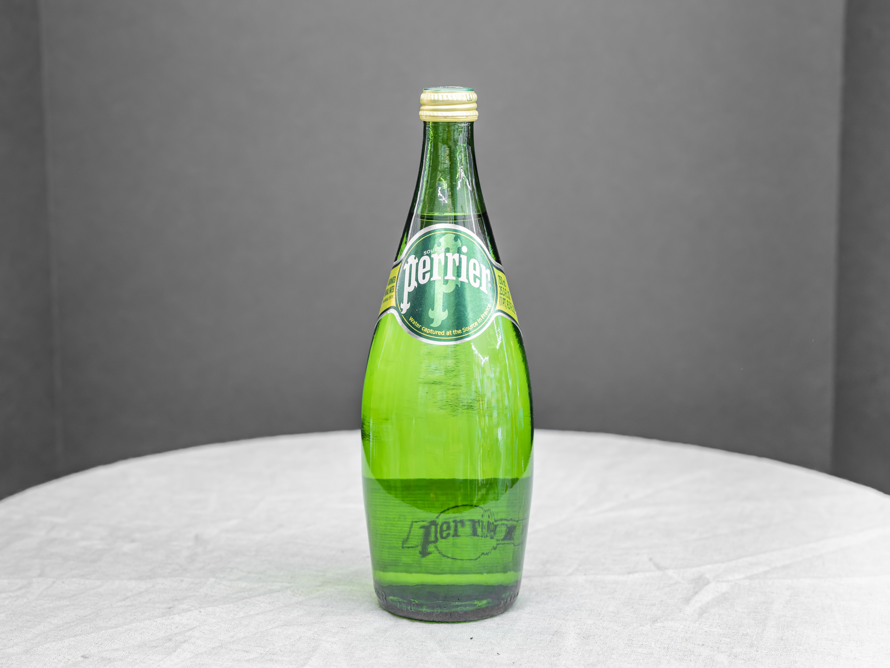 Order 750ml Perrier Carbonated Mineral Water Regular food online from Bistro Liquor store, Huntington Beach on bringmethat.com