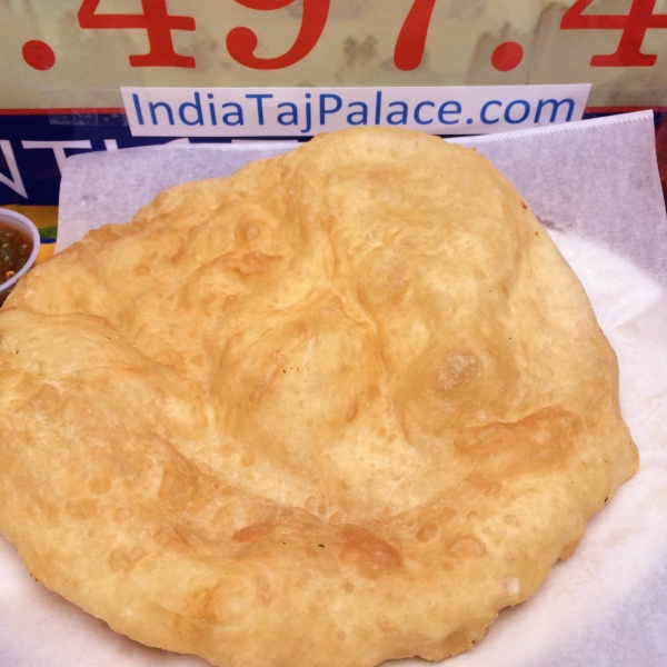 Order C12. Bhadura food online from India Taj Palace store, San Antonio on bringmethat.com
