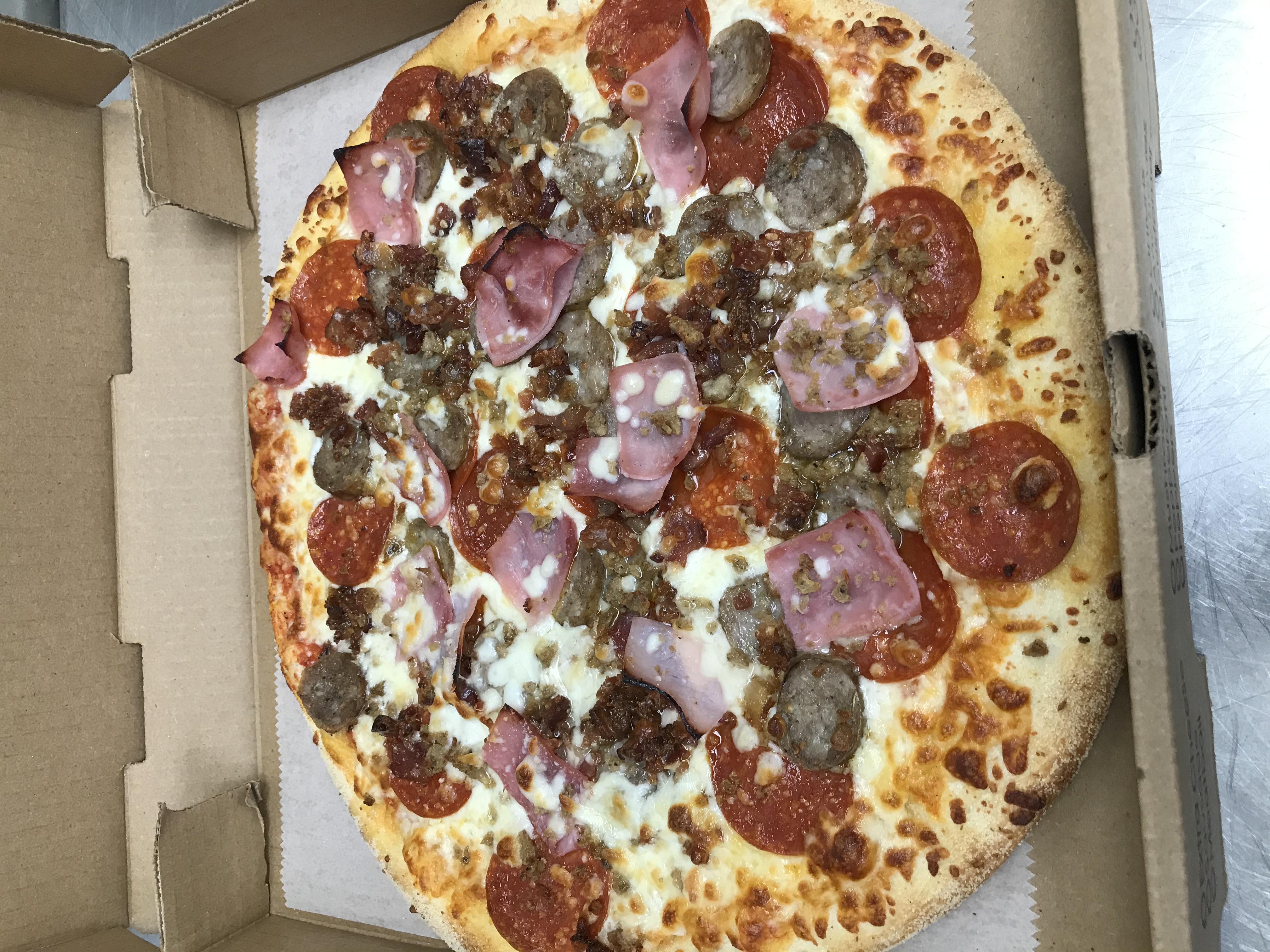 Order Meat Lovers Pizza food online from Arlington Cafe store, Arlington on bringmethat.com