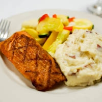 Order Grilled Atlantic Salmon food online from The Original Cottage Inn store, Ann Arbor on bringmethat.com