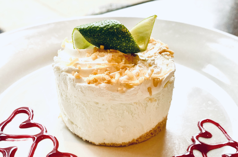 Order Key Lime Pie food online from Press Box Grill store, Dallas on bringmethat.com