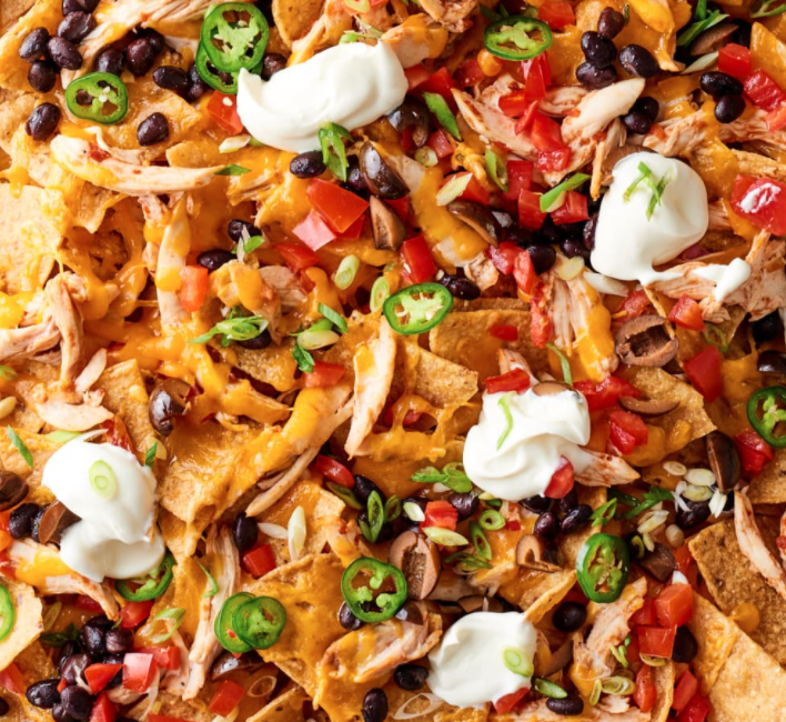 Order NACHOS food online from Austin's Saloon and Eatery store, Libertyville on bringmethat.com