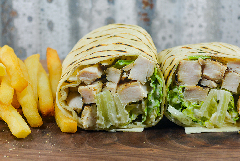Order Chicken Caesar Wrap food online from Ciconte Pizzeria Gibbstown store, Greenwich Township on bringmethat.com